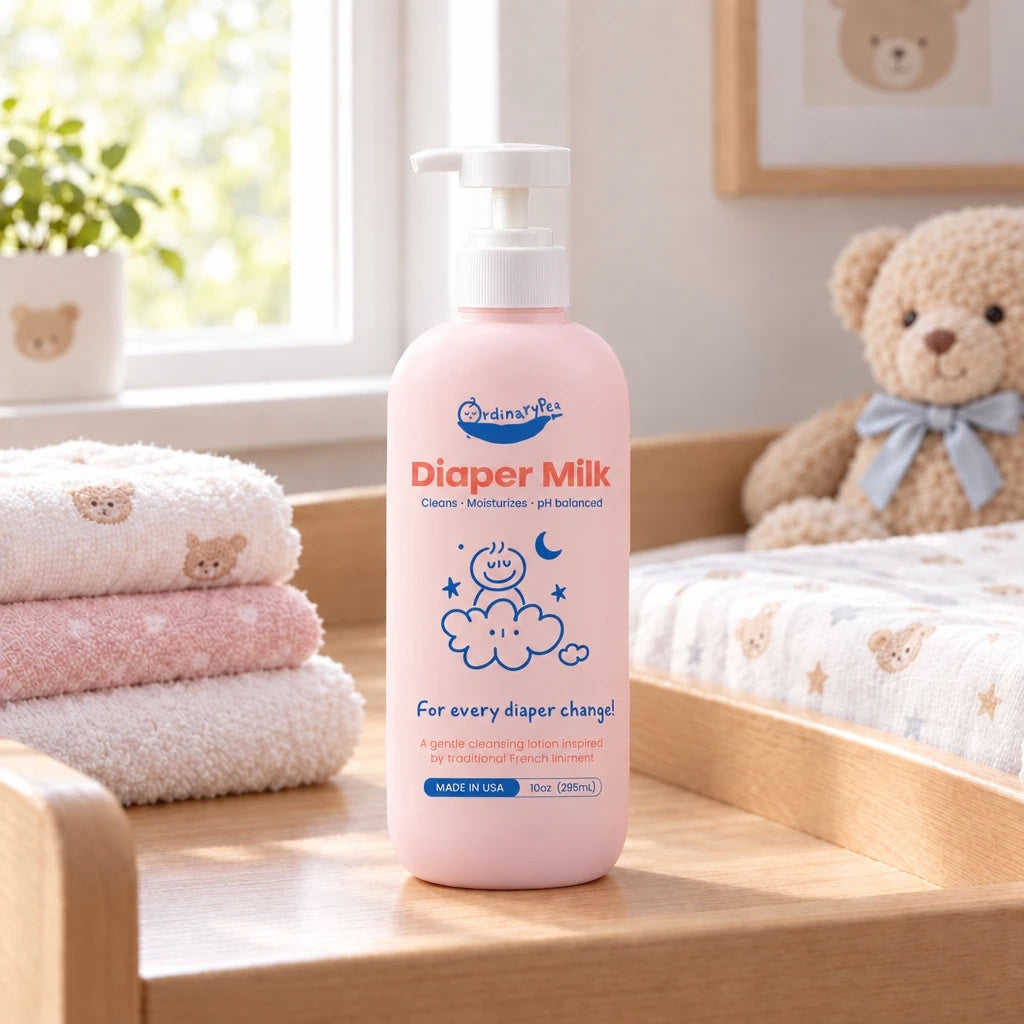 Diaper Milk bottle on a nursery changing table